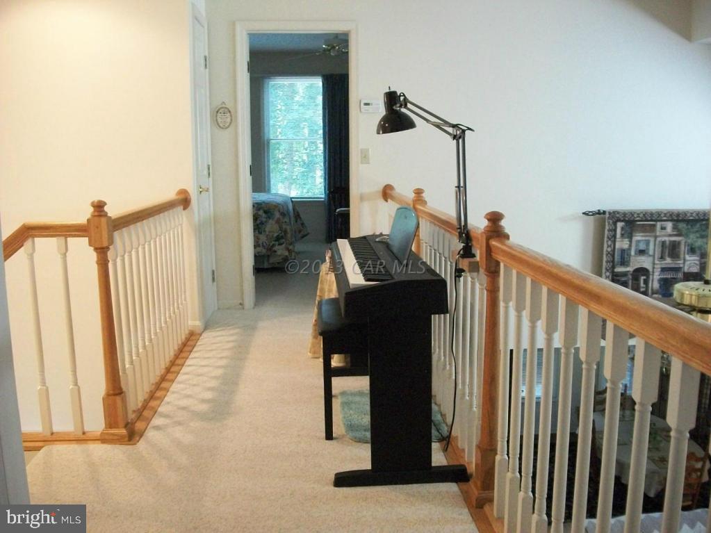 273 Windjammer Road Ocean Pines, MD 21811 - Photo 20 of 33 a view of a hallway with windows and stairs
