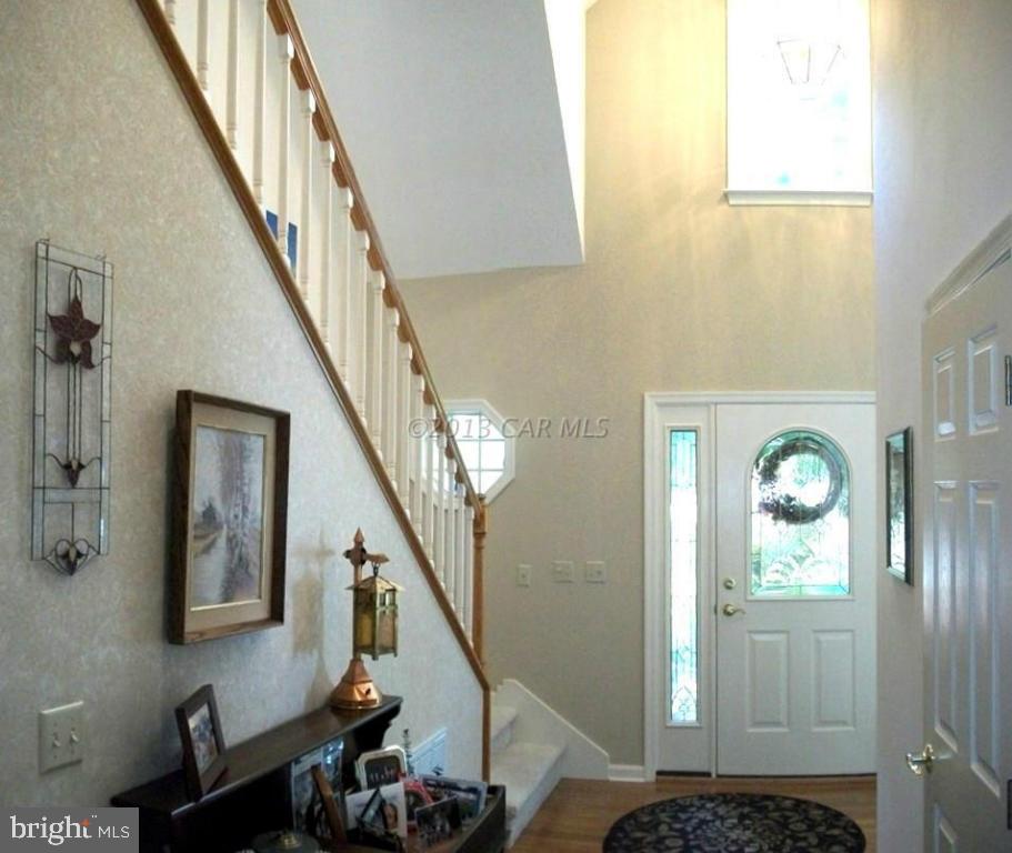 273 Windjammer Road Ocean Pines, MD 21811 - Photo 4 of 33 a view of entryway and hall with wooden floor