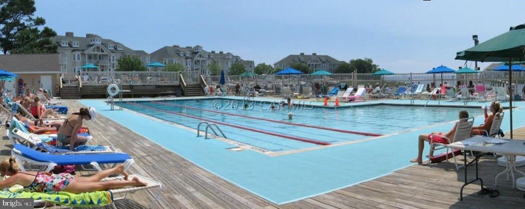 273 Windjammer Road Ocean Pines, MD 21811 - Photo 32 of 33 a view of a swimming pool with lounge chairs