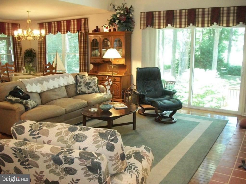 273 Windjammer Road Ocean Pines, MD 21811 - Photo 8 of 33 a living room with furniture and a large window