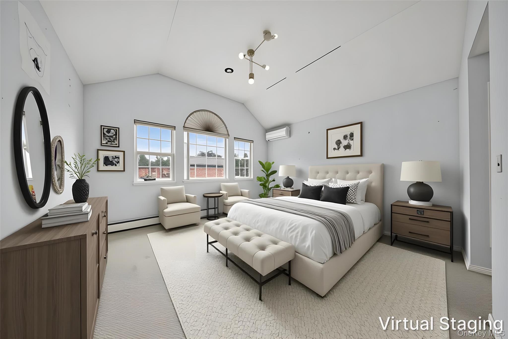 82 B Inwood Road Port Washington, NY 11050 - Photo 19 of 41 a spacious bedroom with a bed a couch and large window