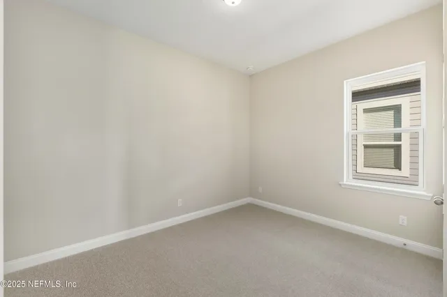 a view of kitchen with kitchen island and wooden floor
