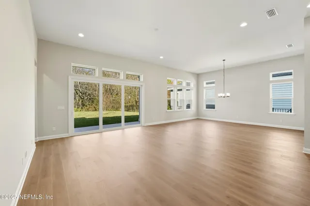 an aerial view of a house with a garden