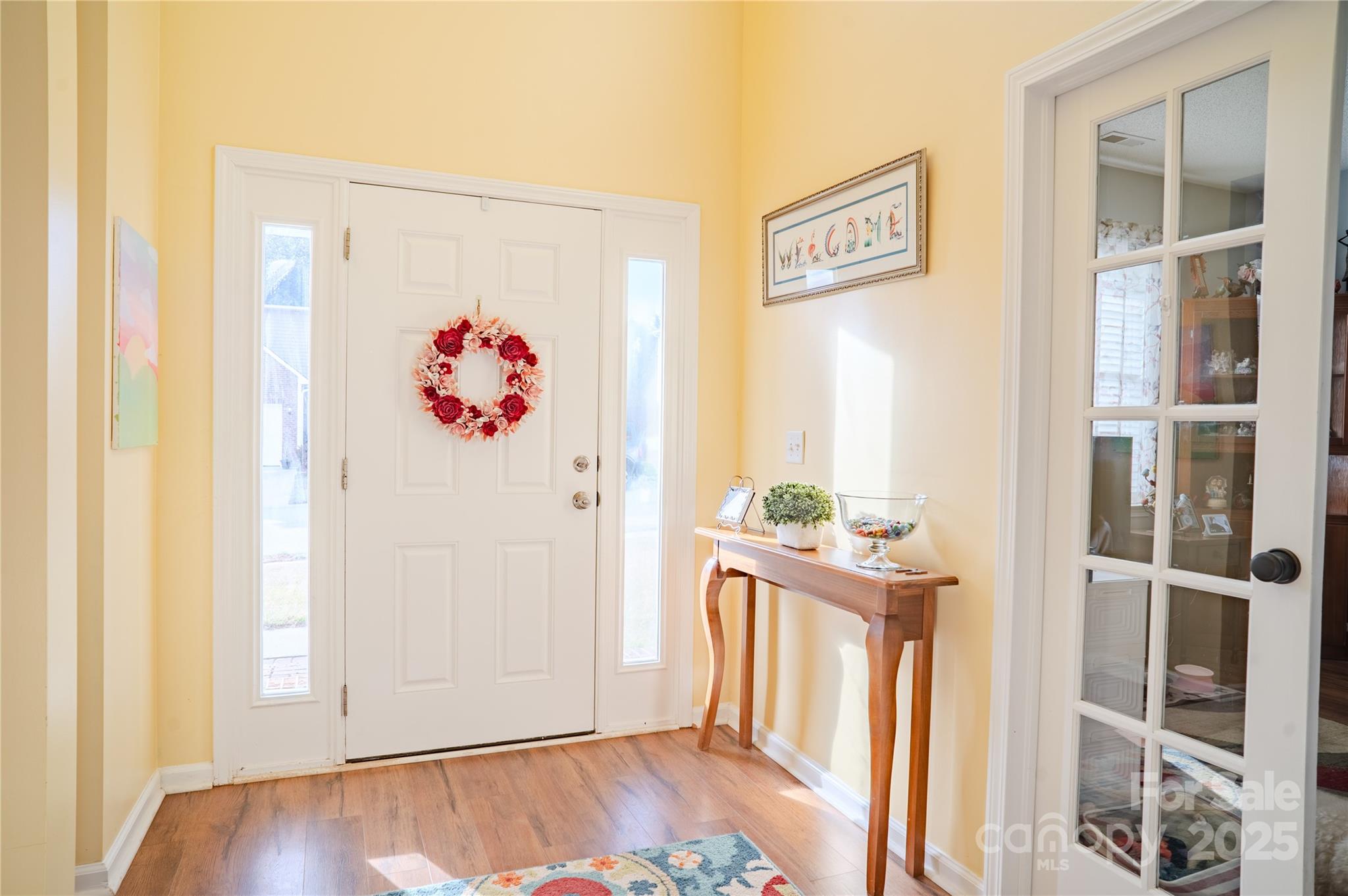 123 Wildbriar Road Fletcher, NC 28732 - Photo 11 of 48 a view of a hallway to rooms and wooden floor