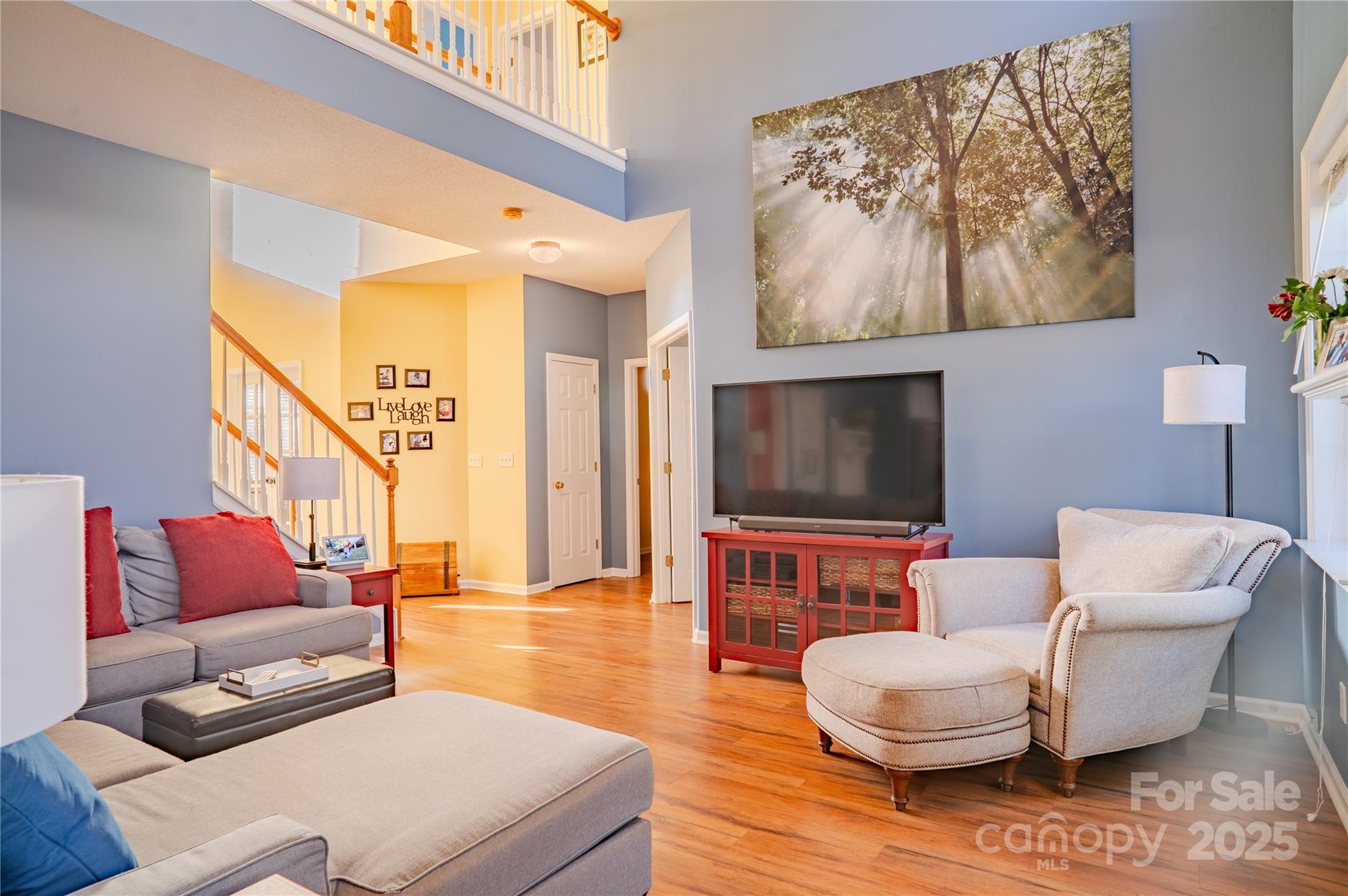 123 Wildbriar Road Fletcher, NC 28732 - Photo 20 of 48 a living room with furniture and a flat screen tv