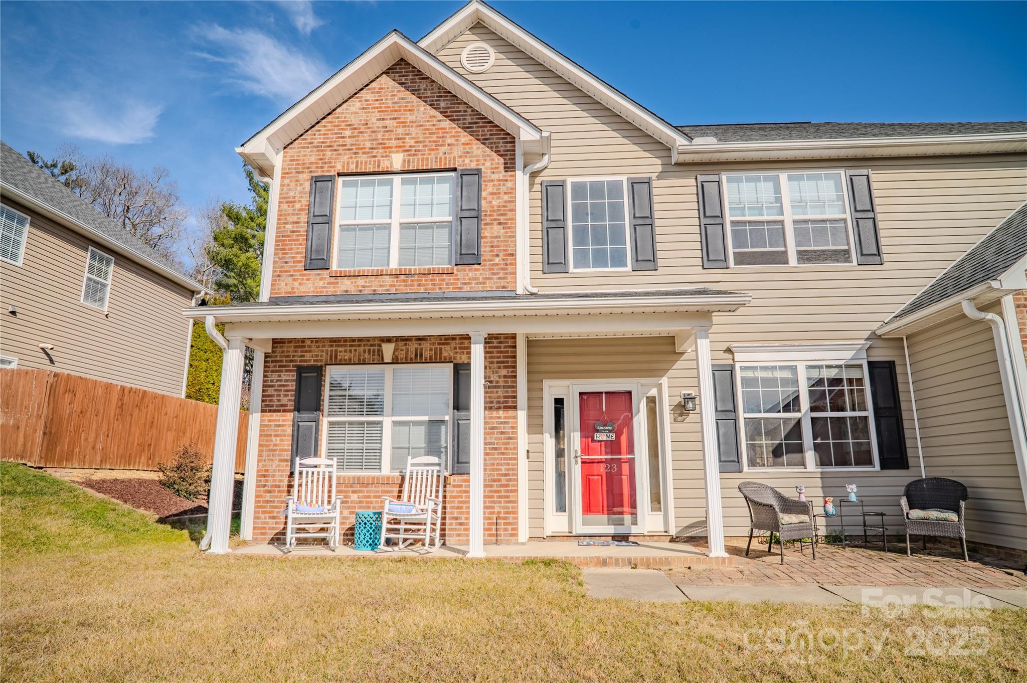 123 Wildbriar Road Fletcher, NC 28732 - Photo 3 of 48 a front view of a house with a patio