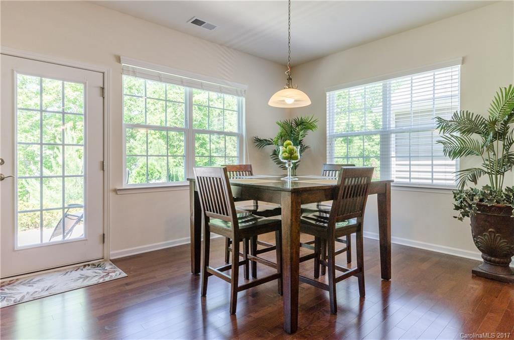 4155 Perth Road Indian Land, SC 29707 - Photo 7 of 24 a view of a dining room with furniture window and wooden floor