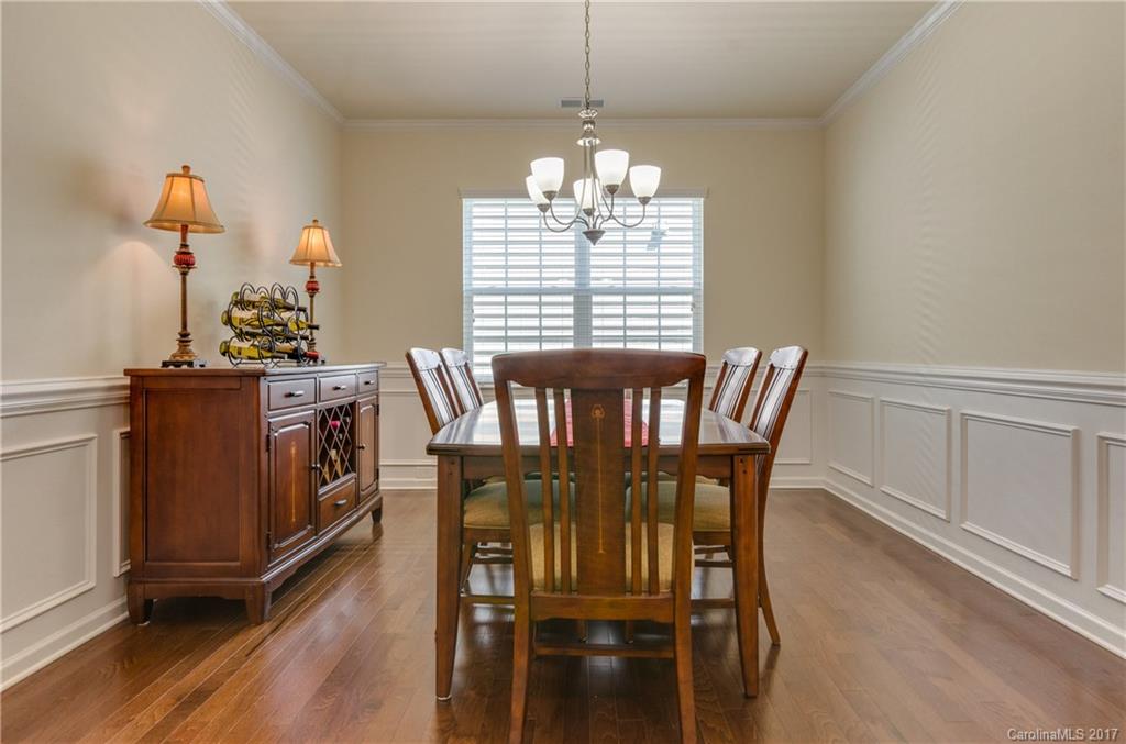 4155 Perth Road Indian Land, SC 29707 - Photo 8 of 24 a view of a dining room with furniture window and wooden floor