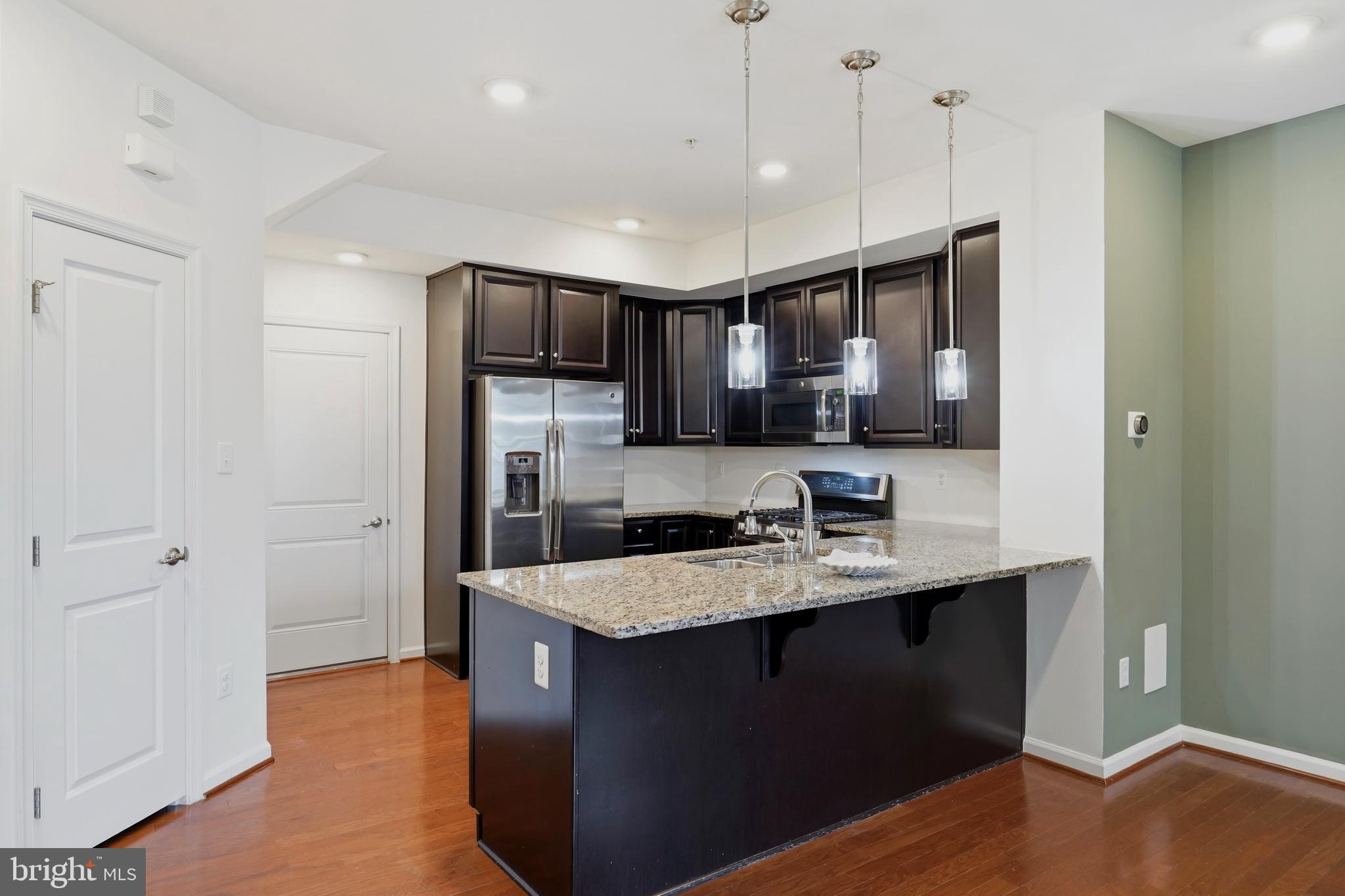 8021 Orchard Grove Road Odenton, MD 21113 - Photo 9 of 31 Granite Countertops and Plenty of Prep Space