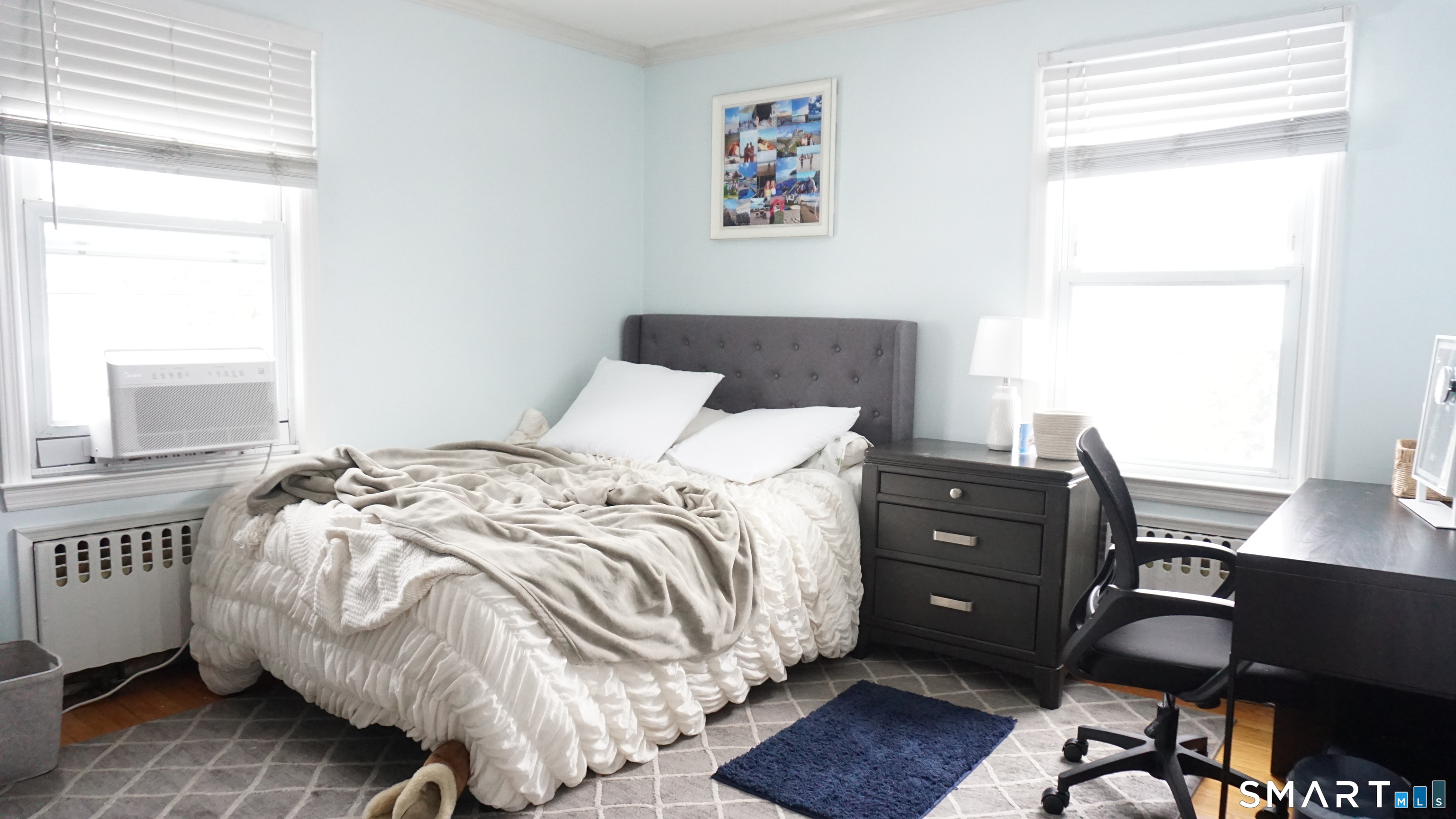 228 Jennings Road Fairfield, CT 06825 - Photo 14 of 22 a bedroom with a bed and a window