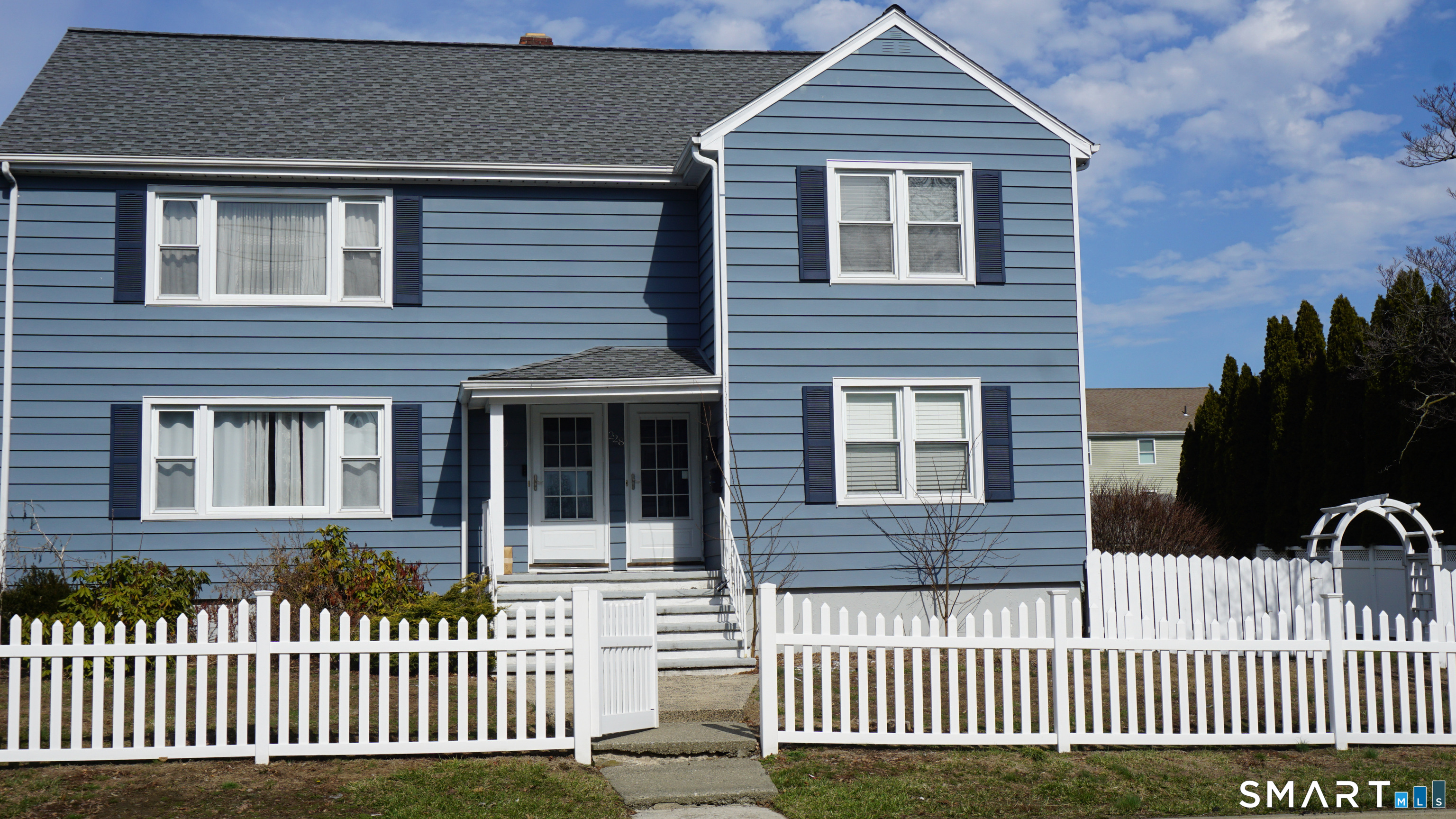 228 Jennings Road Fairfield, CT 06825 - Photo 20 of 22 a front view of a house