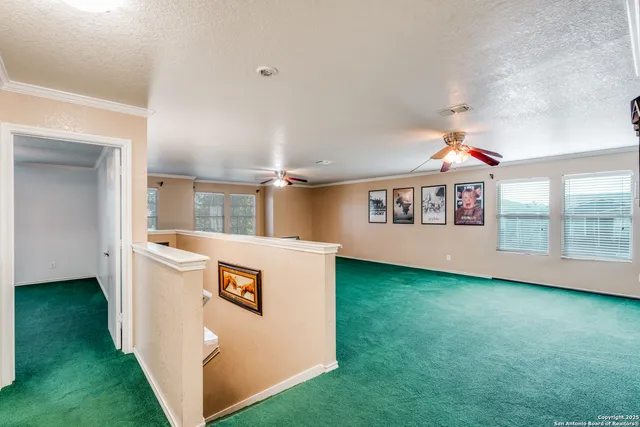 wooden floor with kitchen view