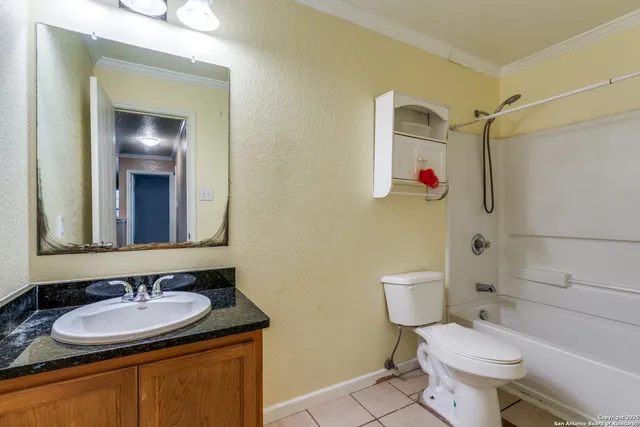 a bathroom with a sink and a toilet