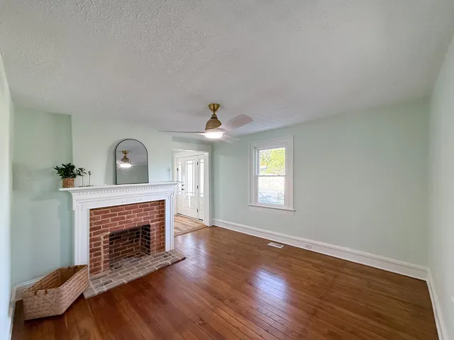 a bathroom with a toilet and a bathtub