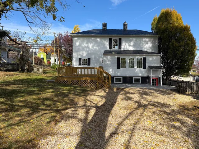 a front view of a house with a garage