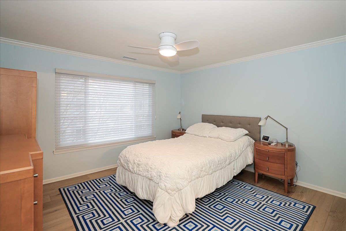 3481 Ravinia Circle Aurora, IL 60504 - Photo 13 of 28 a bedroom with a bed and a window