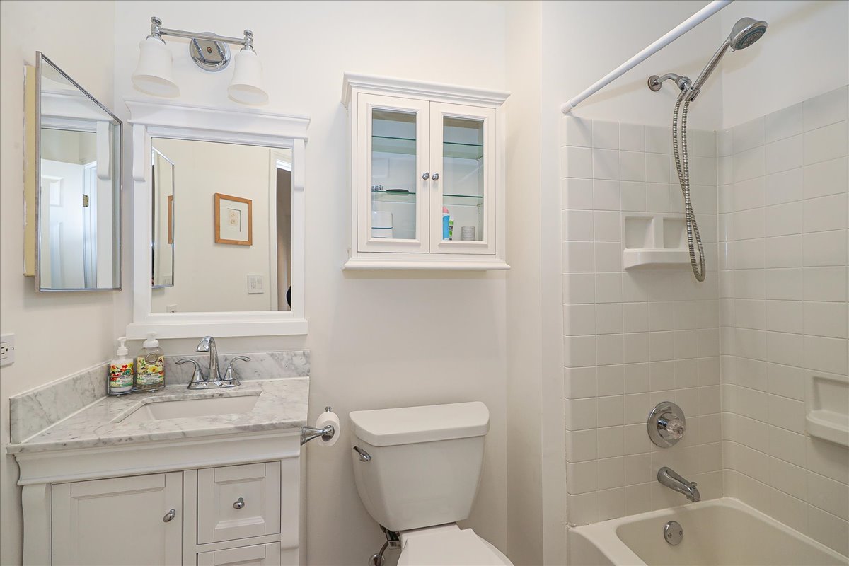 3481 Ravinia Circle Aurora, IL 60504 - Photo 18 of 28 a bathroom with a granite countertop sink toilet and shower