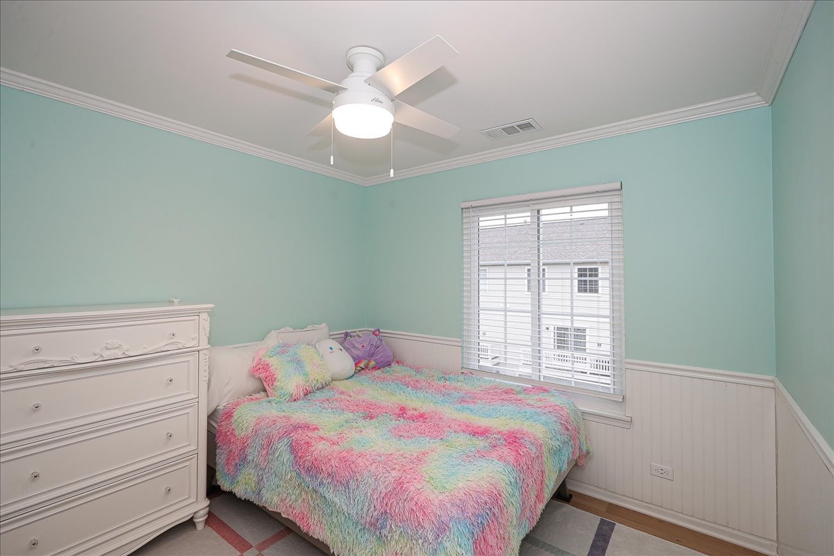 3481 Ravinia Circle Aurora, IL 60504 - Photo 19 of 28 a bedroom with a bed and a window