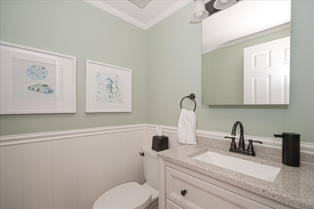 3481 Ravinia Circle Aurora, IL 60504 - Photo 23 of 28 a bathroom with a toilet sink and mirror