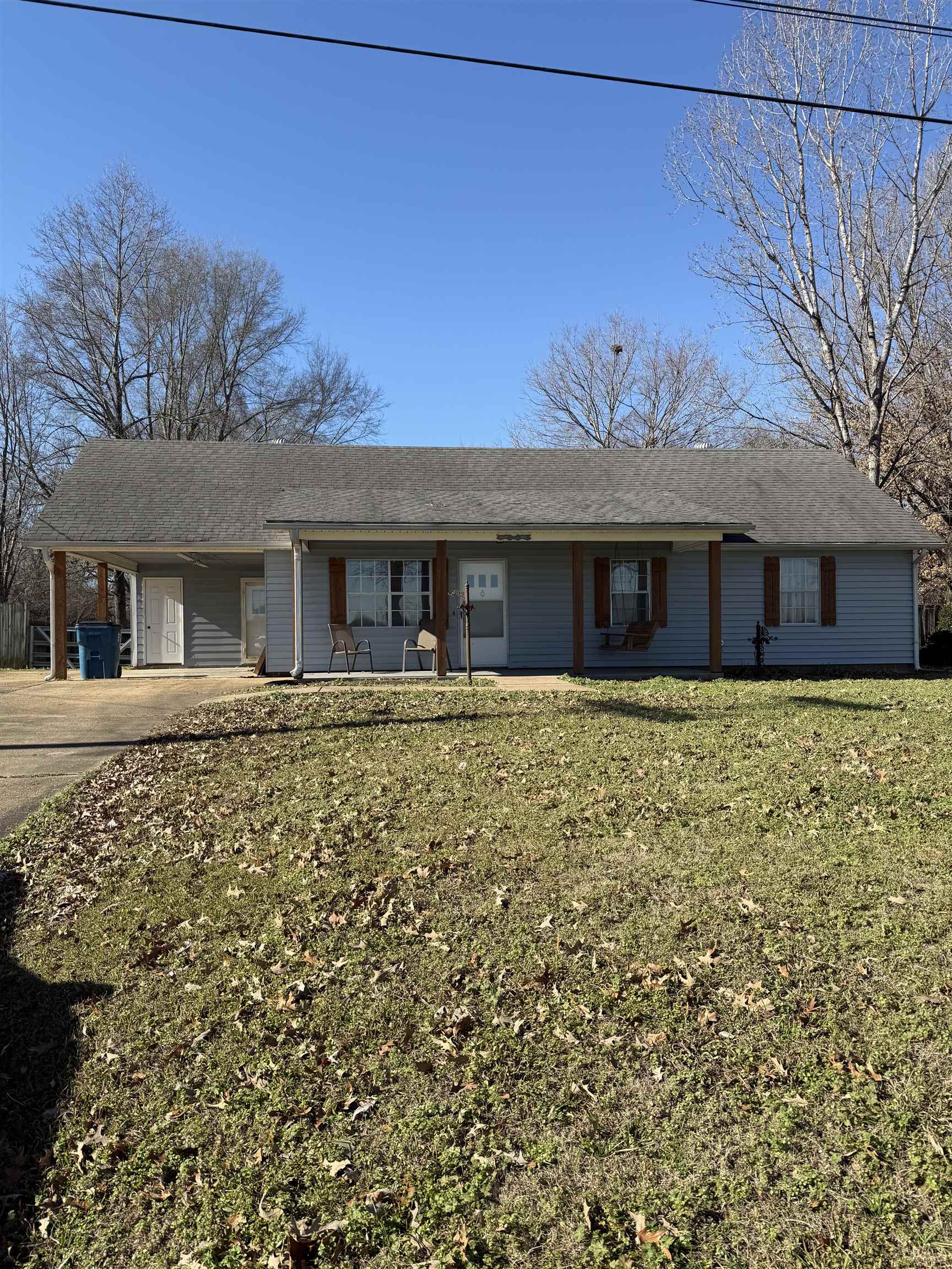 front view of a house with a yard