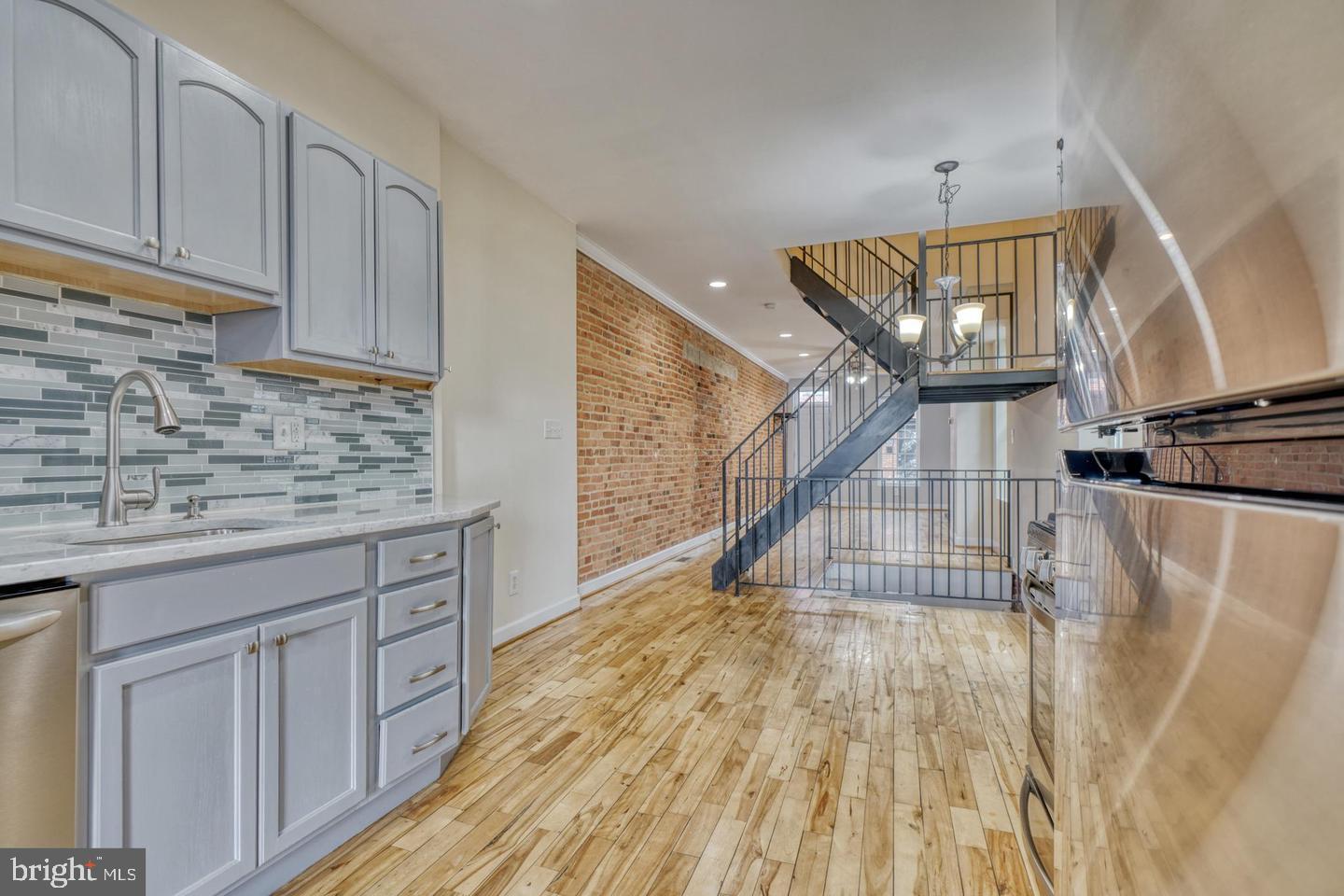 1754 Clarkson Street Baltimore, MD 21230 - Photo 15 of 35 a view of entryway with wooden floor