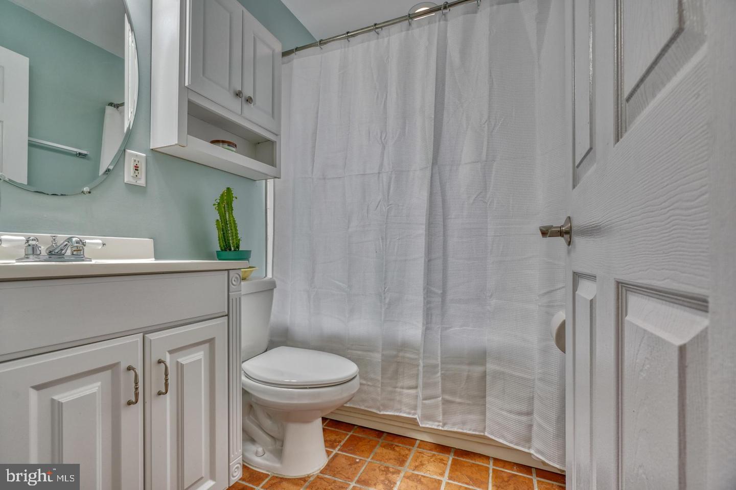 1754 Clarkson Street Baltimore, MD 21230 - Photo 28 of 35 a bathroom with a sink a toilet and shower