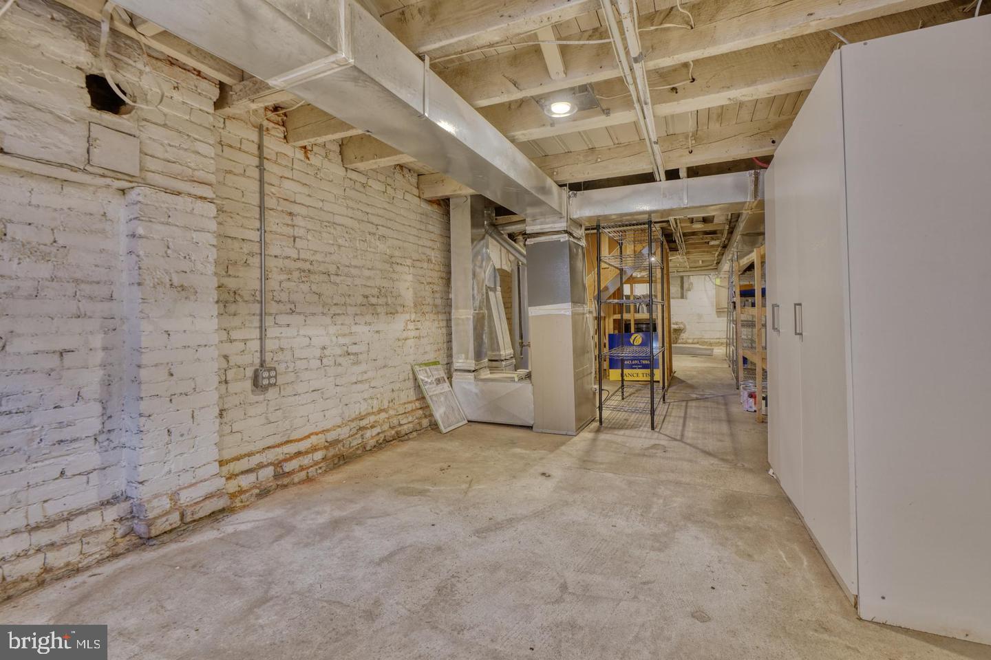 1754 Clarkson Street Baltimore, MD 21230 - Photo 35 of 35 a view of empty room with wooden floor