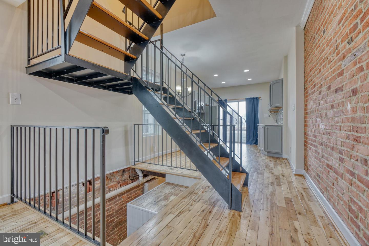 1754 Clarkson Street Baltimore, MD 21230 - Photo 8 of 35 a view of entryway with wooden floor