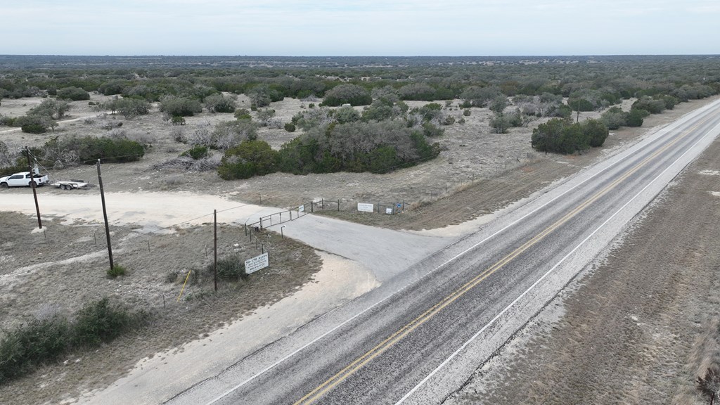 Lot 2 Hwy 55 Rocksprings Tx 78880 Rocksprings, TX 78880 - Photo 4 of 12 a view of a terrace with a yard