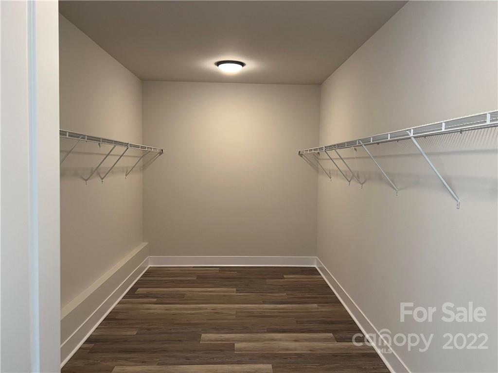 5817 Laney Rogers Road, Unit 5 Monroe, NC 28112 - Photo 12 of 14 a view of a room with racks on the wall