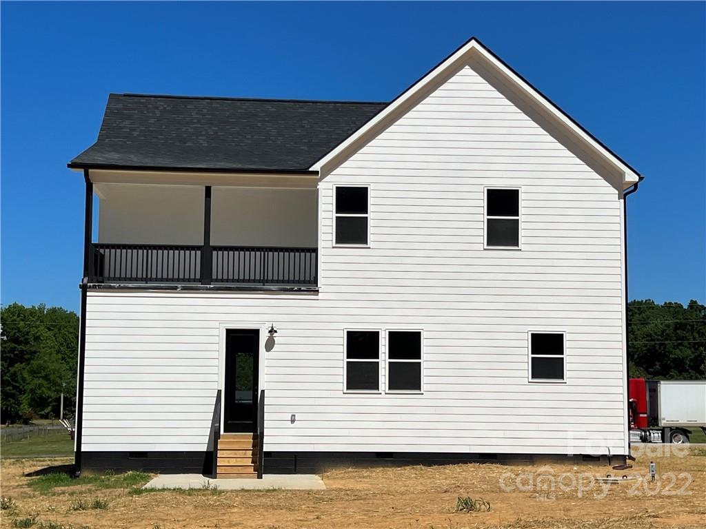5817 Laney Rogers Road, Unit 5 Monroe, NC 28112 - Photo 2 of 14 a view of a house with roof