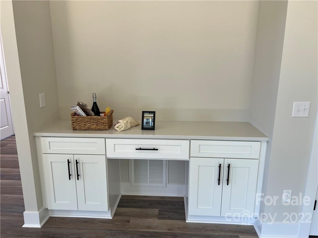 5817 Laney Rogers Road, Unit 5 Monroe, NC 28112 - Photo 6 of 14 a view of white cabinets