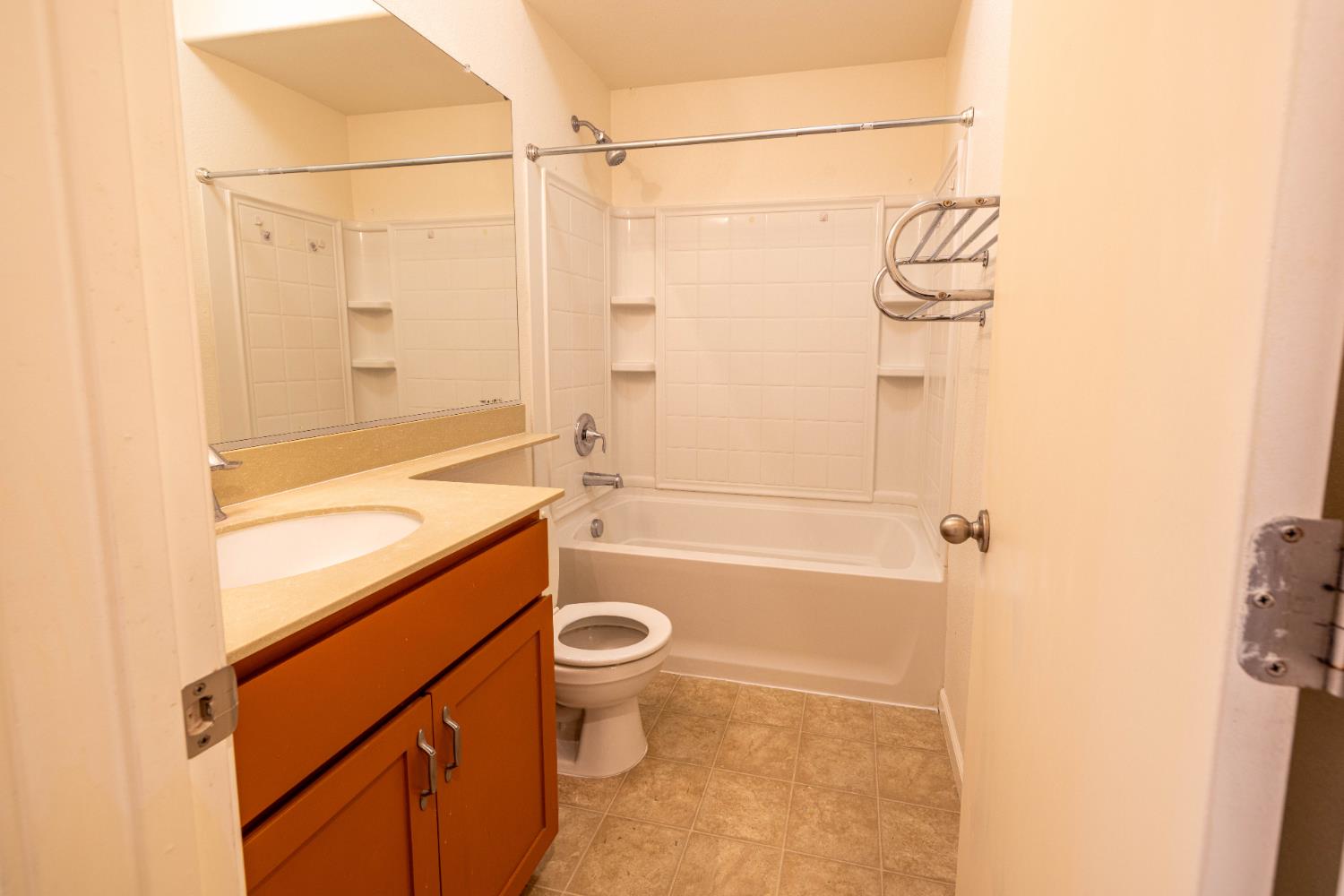 3122 Lea Sterling Way Rancho Cordova, CA 95670 - Photo 23 of 31 a bathroom with a granite countertop sink toilet and shower
