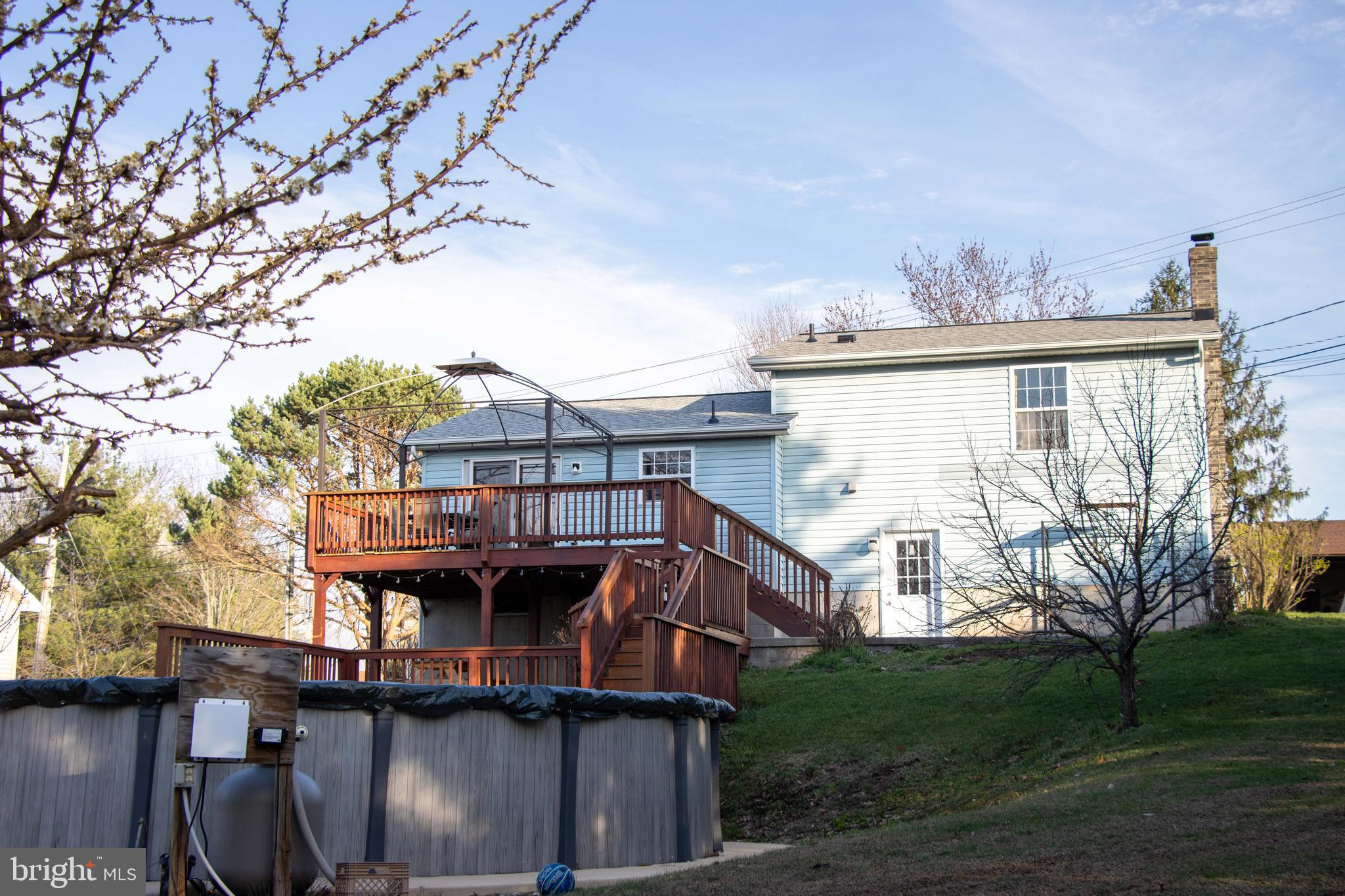 387 West Ridge Loop Road Romney, WV 26757 - Photo 33 of 58 Backyard, Deck & saltwater pool