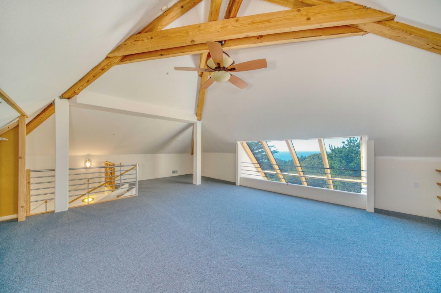775 Alta Vista Road Montara, CA 94037 - Photo 17 of 27 an empty room with windows