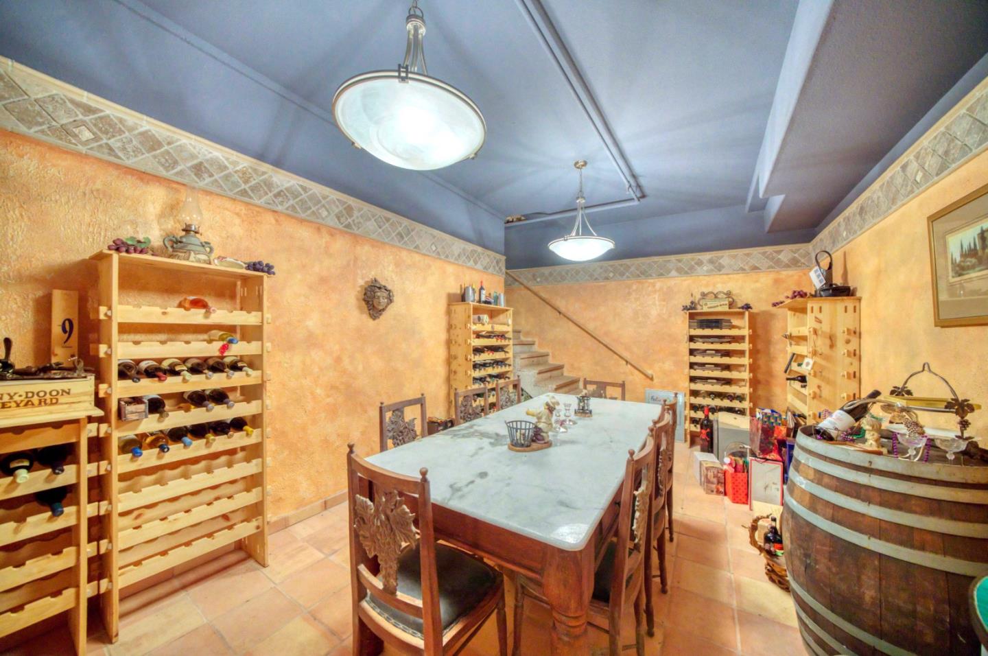 775 Alta Vista Road Montara, CA 94037 - Photo 22 of 27 a view of a balcony with table and chairs