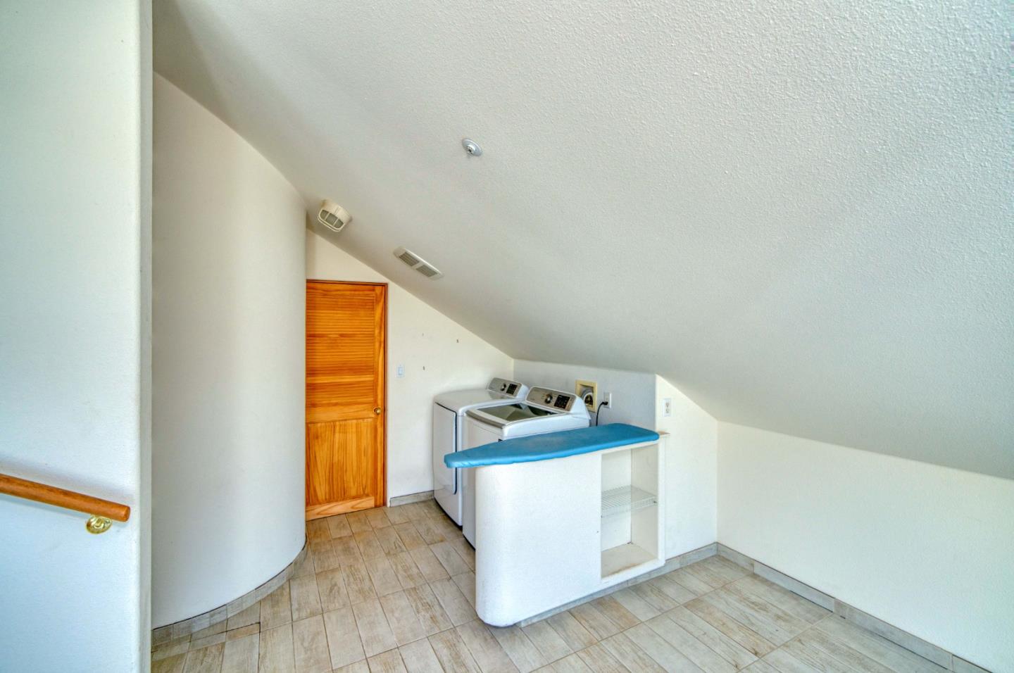 775 Alta Vista Road Montara, CA 94037 - Photo 23 of 27 a room with storage and utility