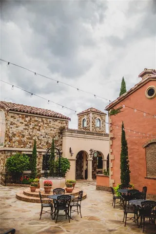 a view of a building with sitting area