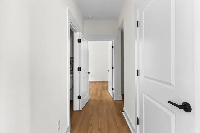 a bed room with a bed and a window