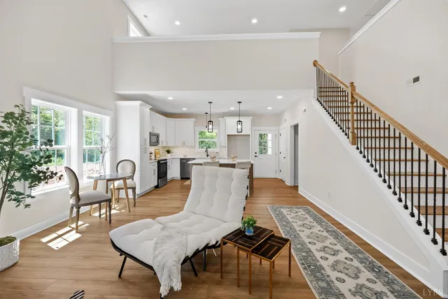 a living room with furniture and a table