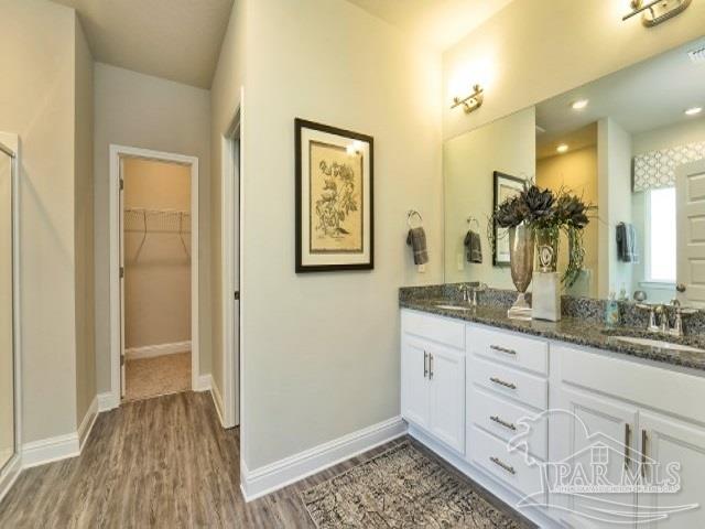 5636 Blake Lane Milton, FL 32571 - Photo 10 of 27 a bathroom with a sink and a mirror