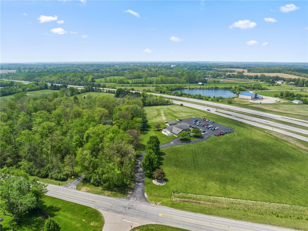 1353 Foust Road Xenia, OH 45385 - Photo 7 of 50 Expansive acreage provides ample space for potential development with scenic lake views.