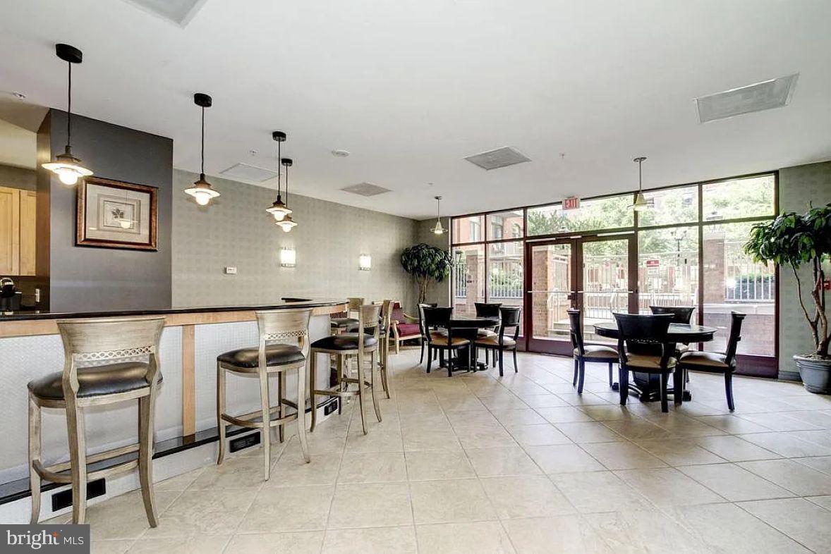 1220 North Fillmore Street, Unit 909 Arlington, VA 22201 - Photo 24 of 38 a view of a dining room with furniture window and outside view