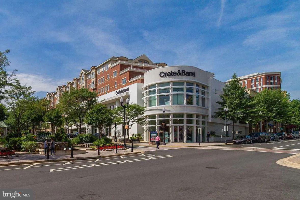 1220 North Fillmore Street, Unit 909 Arlington, VA 22201 - Photo 27 of 38 a front view of a building with street view