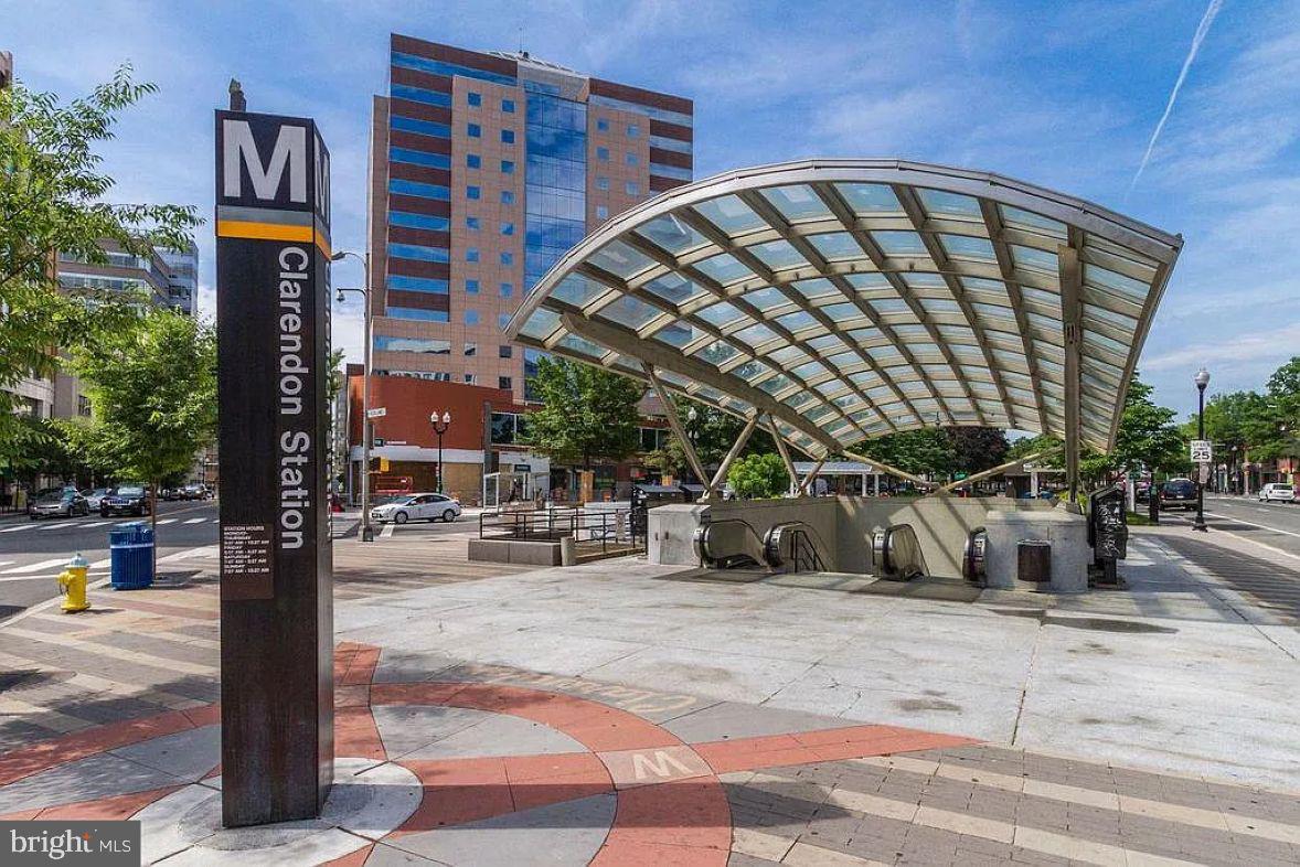 1220 North Fillmore Street, Unit 909 Arlington, VA 22201 - Photo 28 of 38 a front view of a building with sitting area