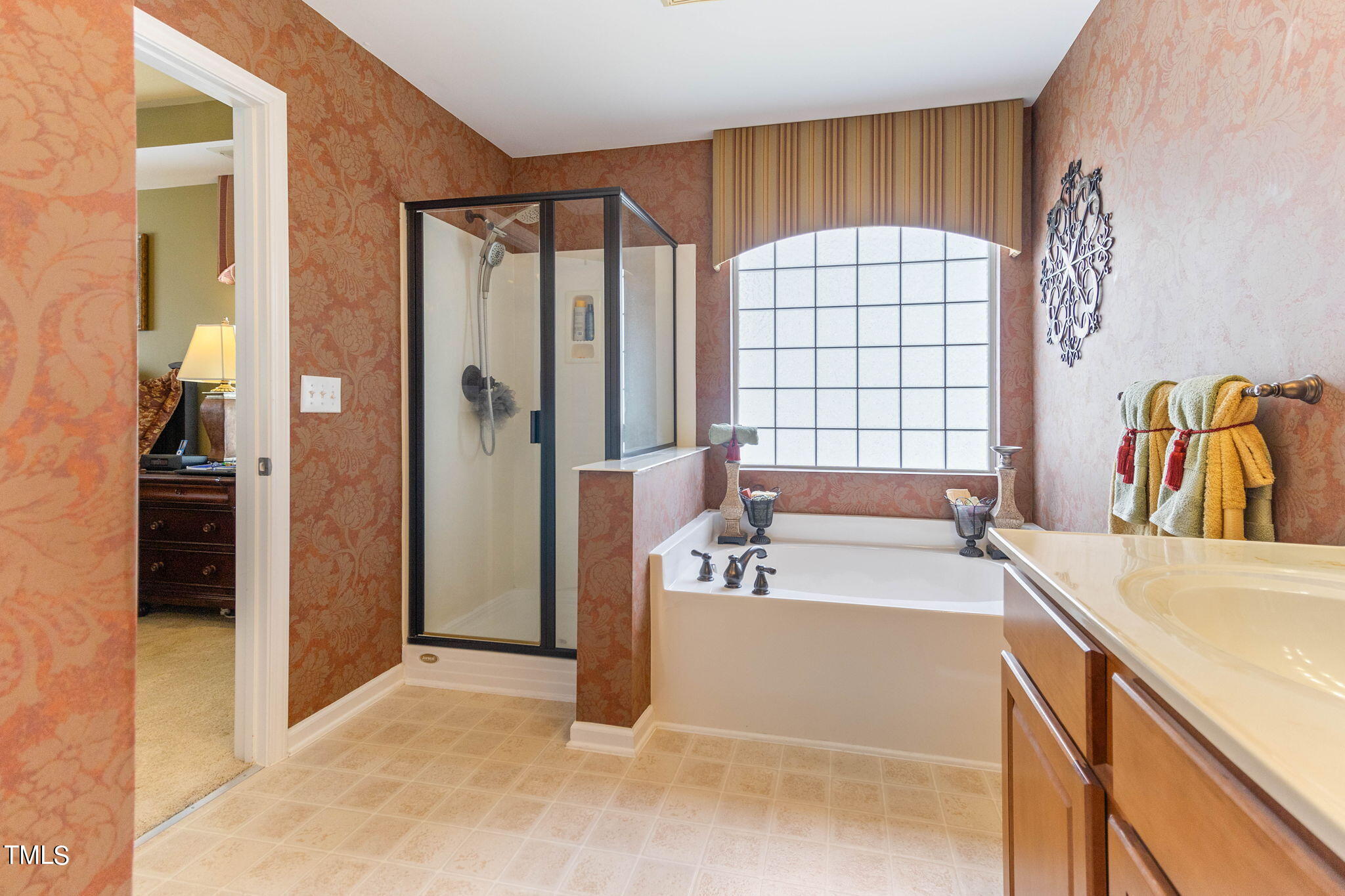 954 Spring Meadow Drive Durham, NC 27713 - Photo 26 of 47 Primary bathroom with soaking tub and walk in shower!