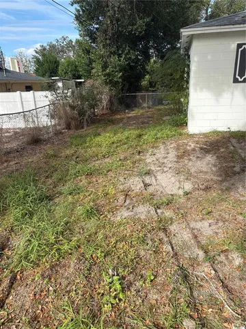 a view of backyard with outdoor space