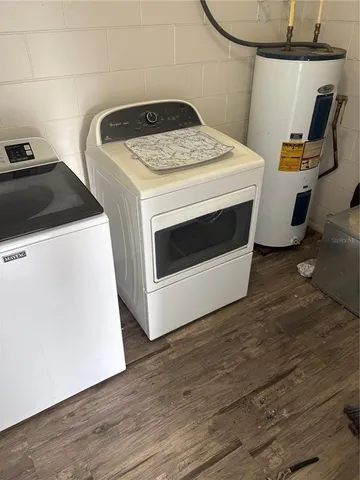 a utility room with dryer and washer