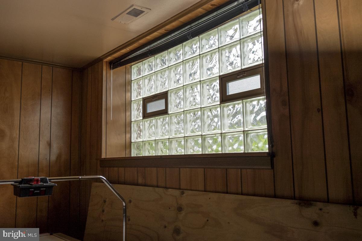 1597 Lynch Road Baltimore, MD 21222 - Photo 12 of 27 Distinctive glass block FA room window