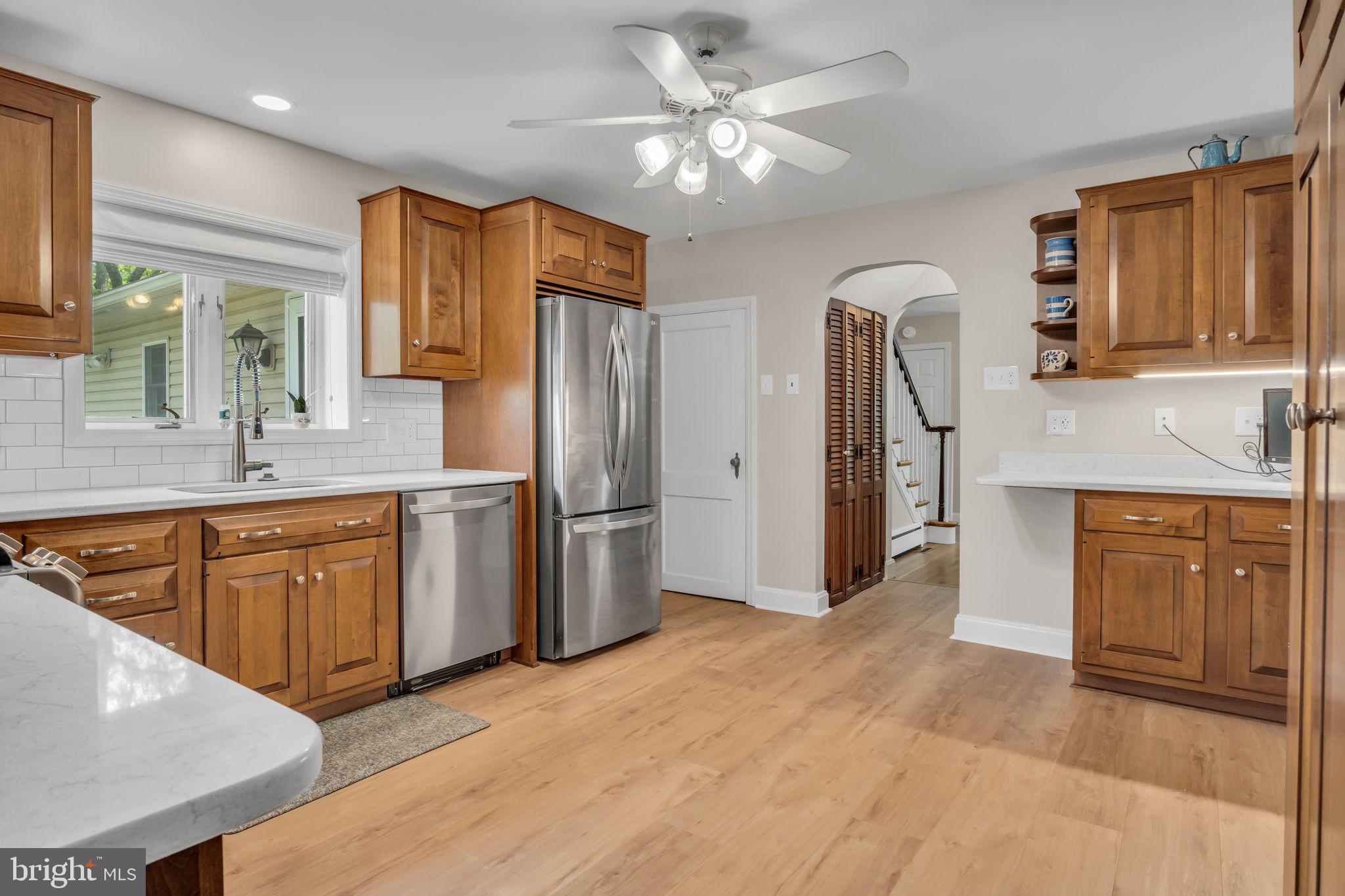 1037 Siddonsburg Road Lewisberry, PA 17339 - Photo 13 of 61 a kitchen with stainless steel appliances granite countertop a refrigerator and a sink